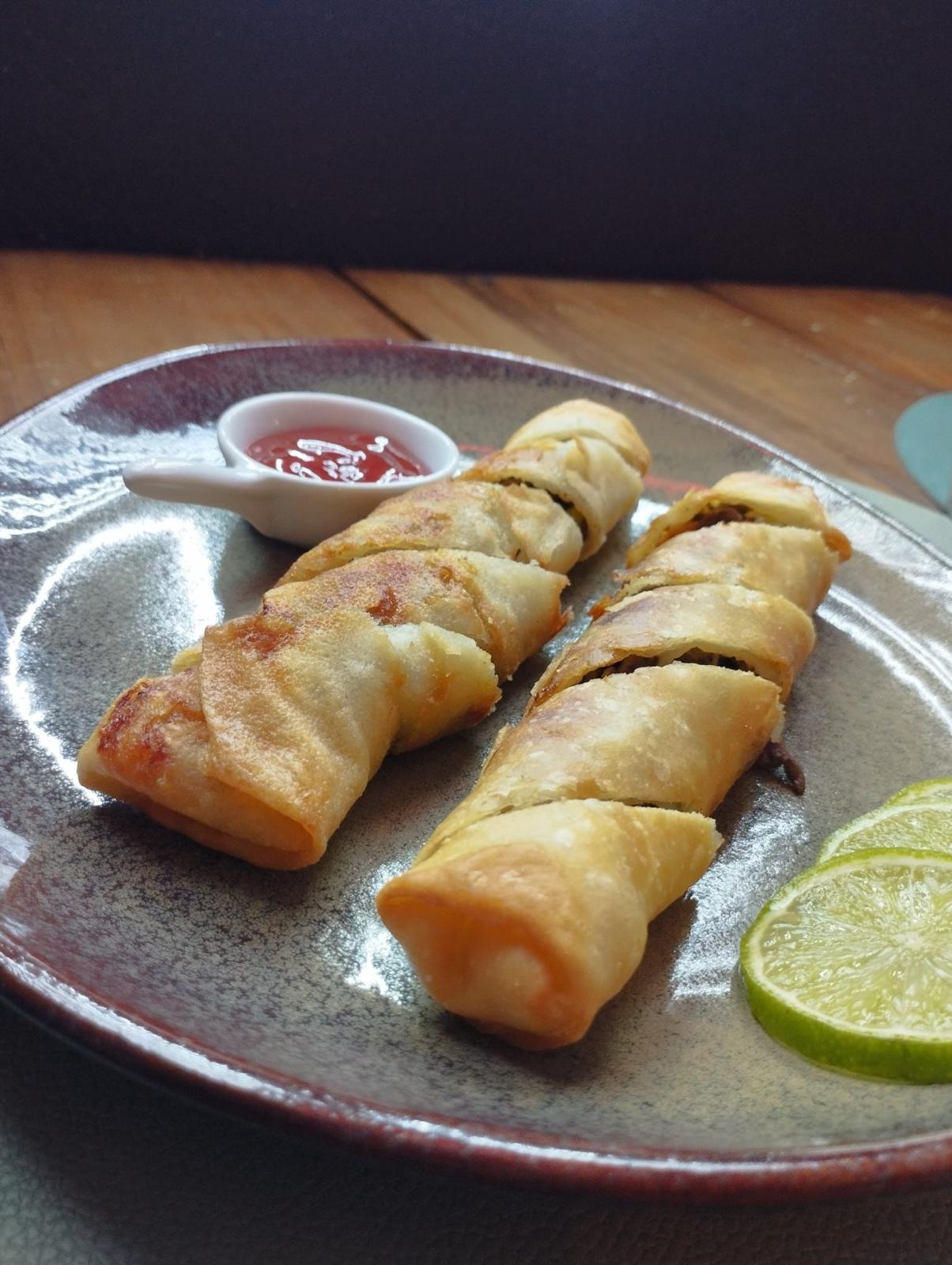 Crispy spring rolls with sweet and sour sauce