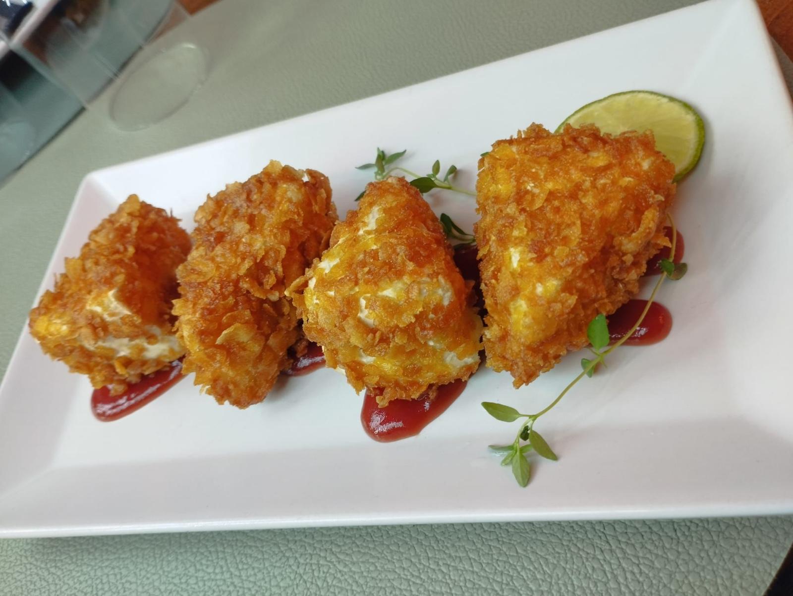 Portuguese seafood croquettes with house sauce
