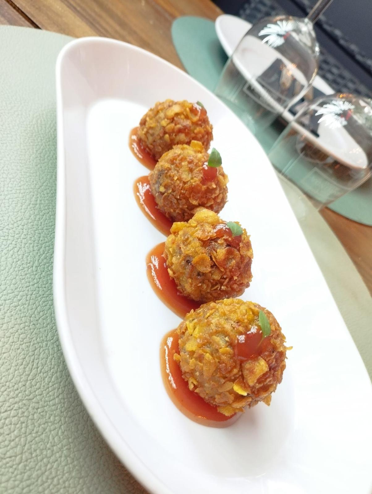 Golden seafood fritters with coastal flavors