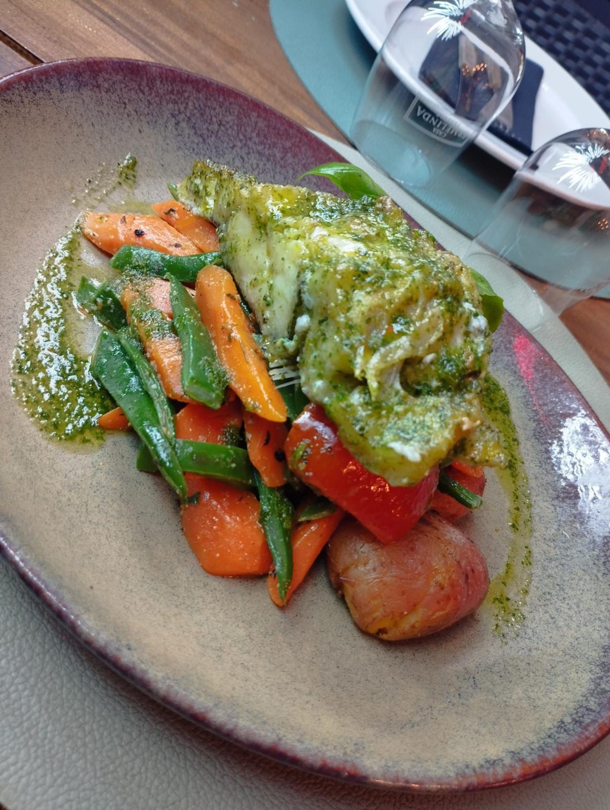Fresh fish with basil and roasted vegetables