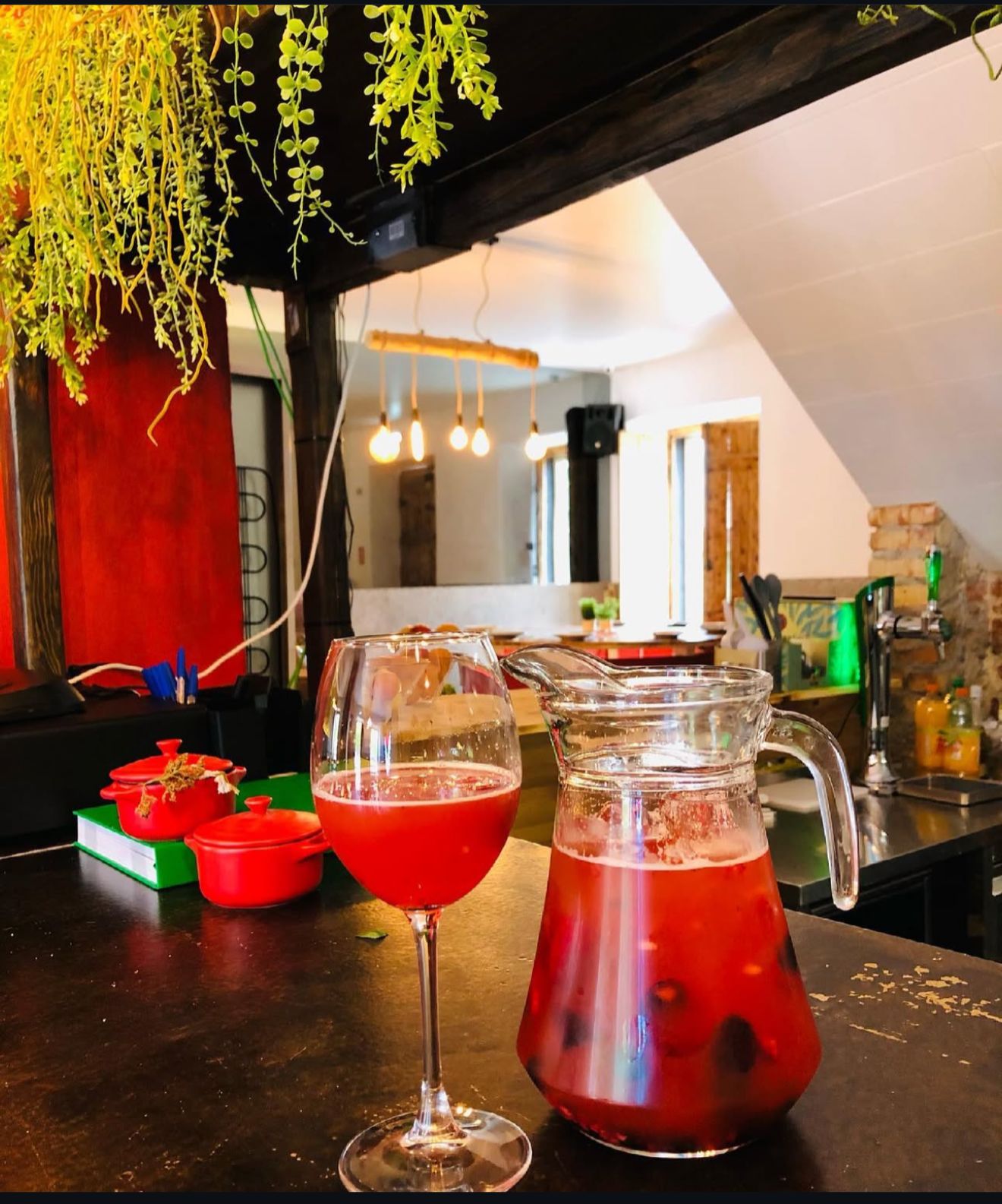 Red cocktails and cozy bar atmosphere